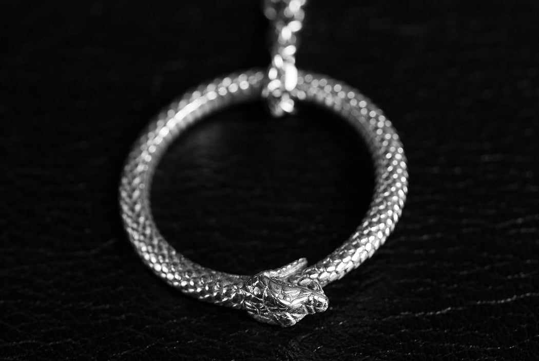 Ouroboros symbol: Wholeness, Paradox, Renewal - NOIR KĀLA